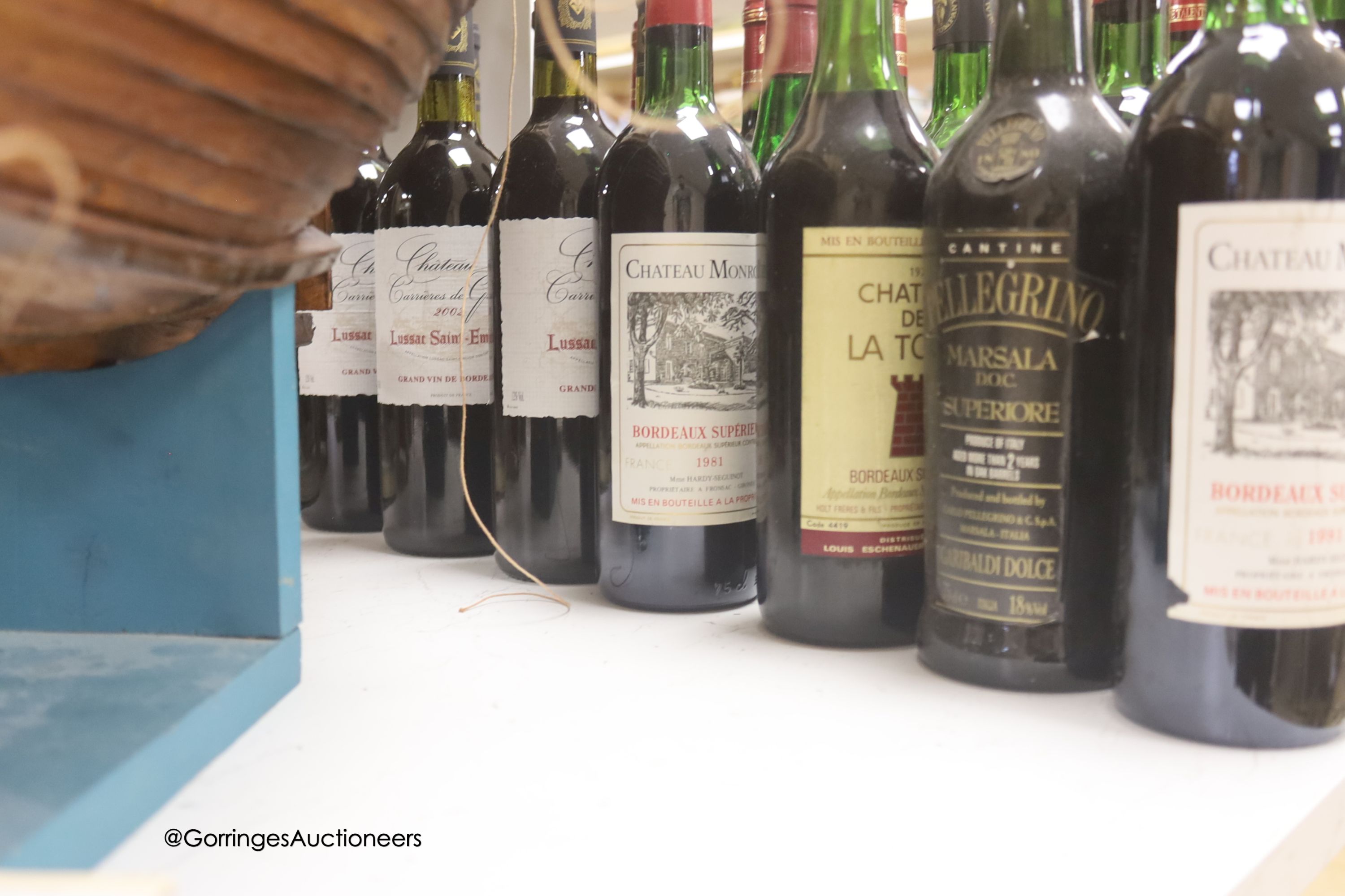 Twenty bottles of assorted red wines including six Roc De Lussac 2006 and six Carriers De Grenet 2002